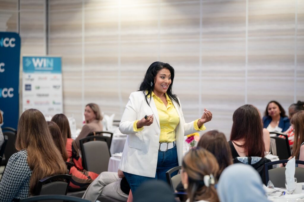 Crystal D’Cunha speaking to a full room at a live session